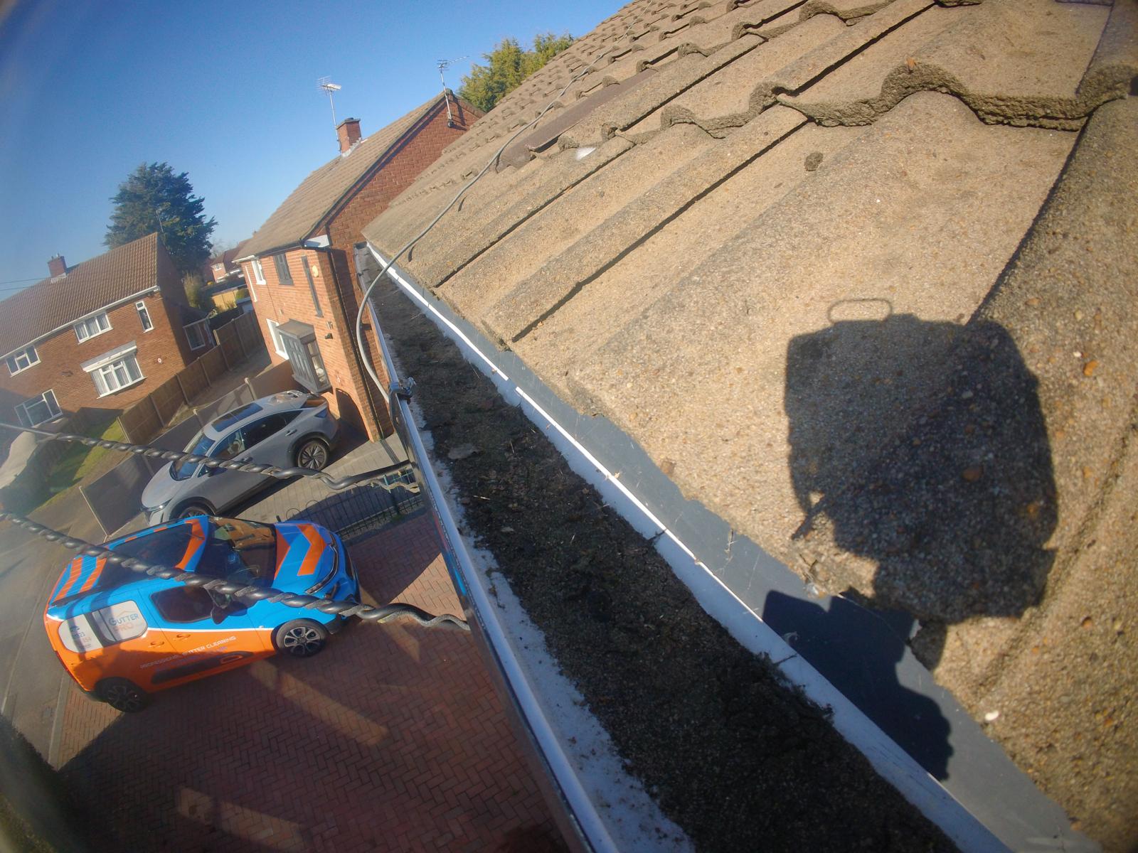 Clean bright gutters after professional exterior gutter cleaning by Gutter Pro